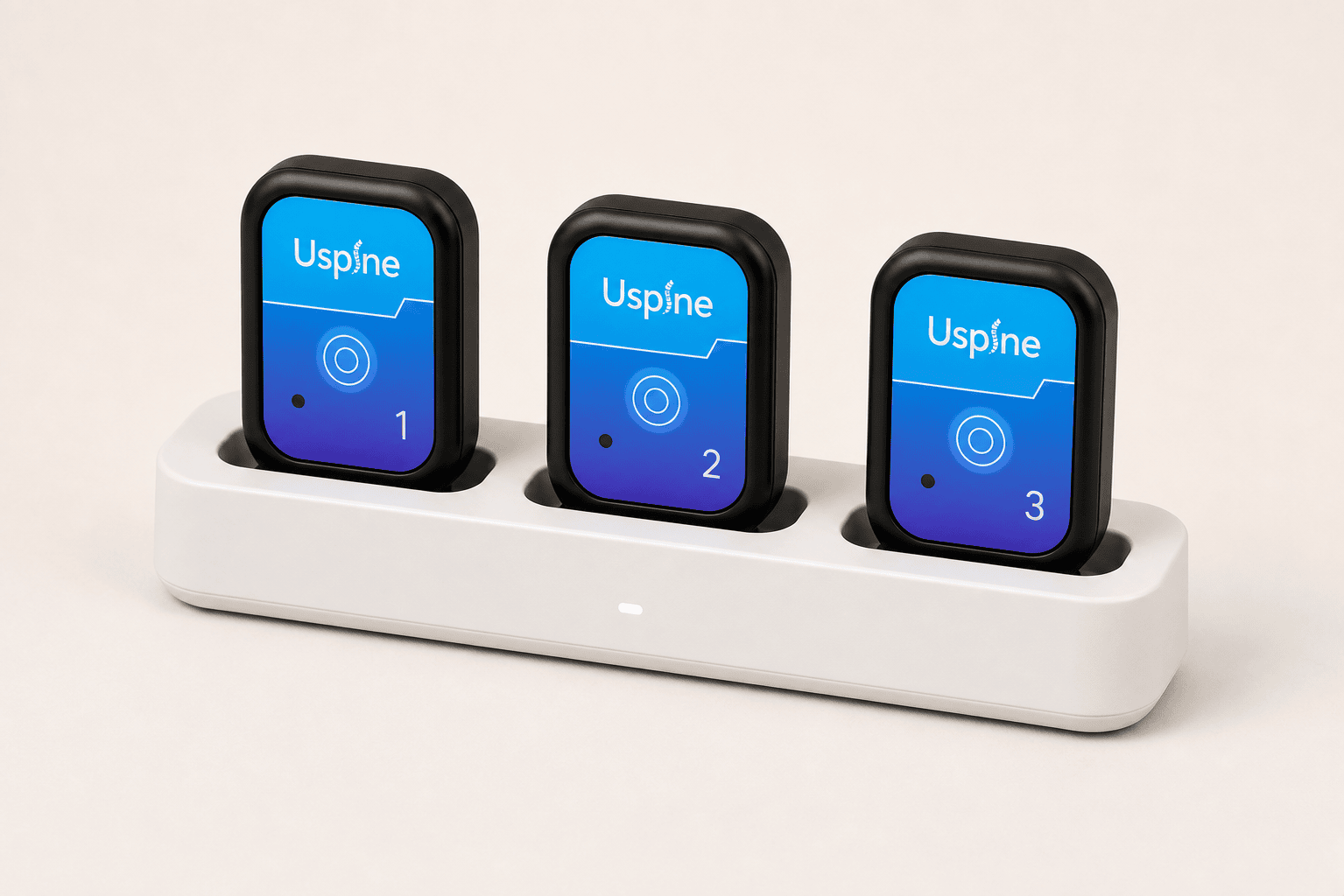 Uspine Home three-sensor set in its charging dock